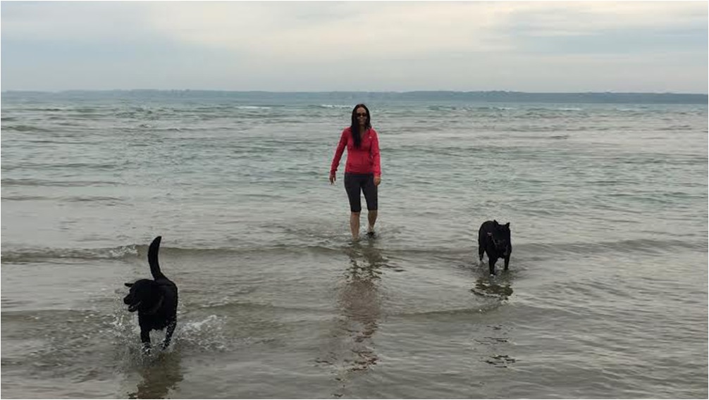 Picture of Pamela and her dogs in the water