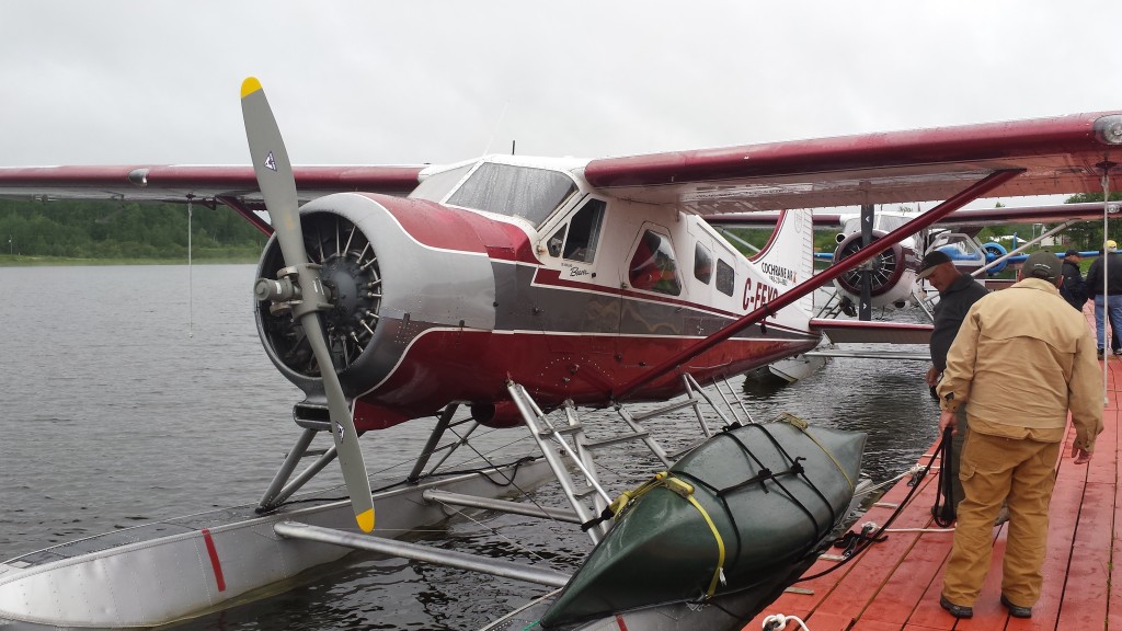 Figure 1 Beaver float plane prepares for takeoff with first canoe and team members